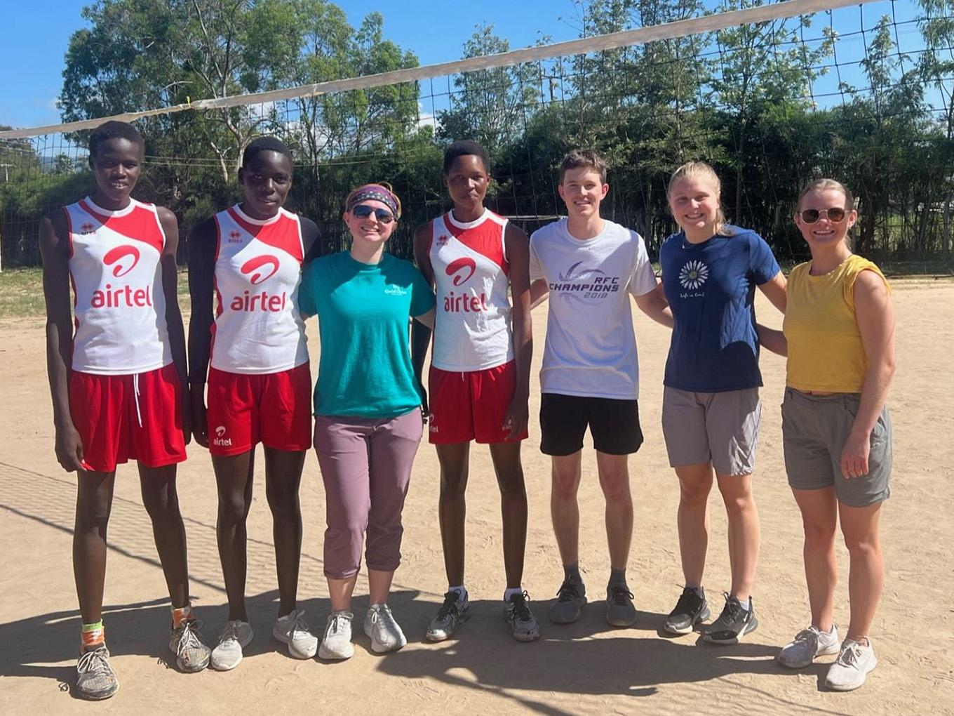 U of M students with Kenyan volleyball players.