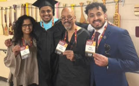 Neil Mendonca with family at graduation.